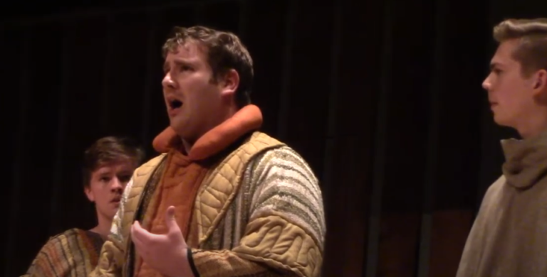 Lehi singing to his sons in a staged mini-production of a scene from He Shall Prepare a Way